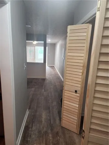 a kitchen with a sink and chandelier