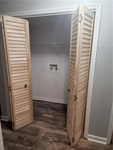 a view of roof deck with chair and bathtub