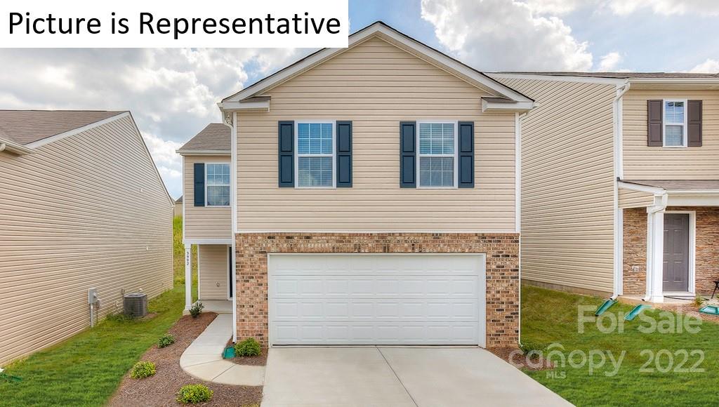 5034 Fandango Road York, SC 29745 - Photo 1 of 24 a front view of a house with garden