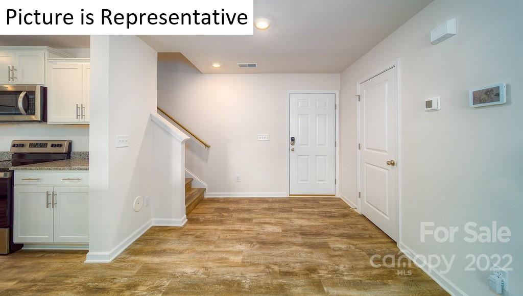 5034 Fandango Road York, SC 29745 - Photo 9 of 24 a view of a hallway with white walls
