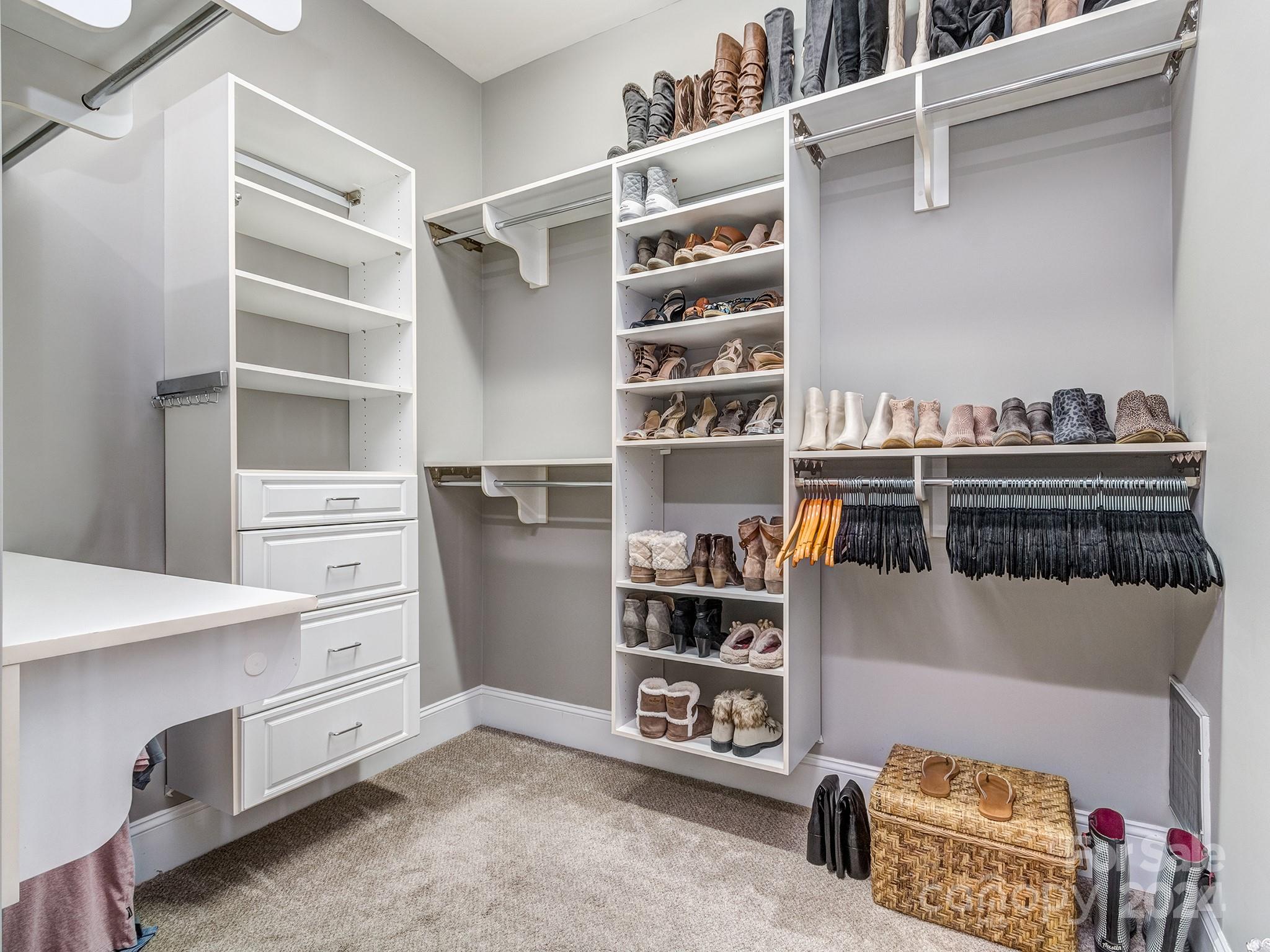 736 Cooks Cove Ridge Clover, SC 29710 - Photo 21 of 40 a view of walk in closet with clothes and shoes