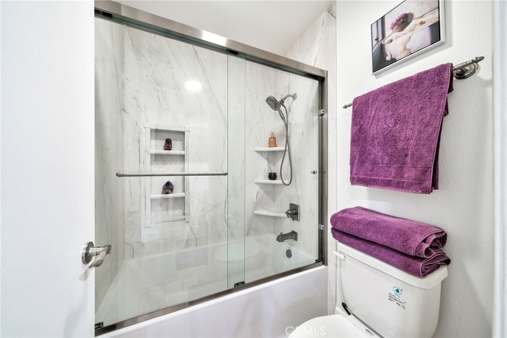 5151 Walnut Avenue, Unit 34 Irvine, CA 92604 - Photo 17 of 38 a bathroom with a toilet and a shower