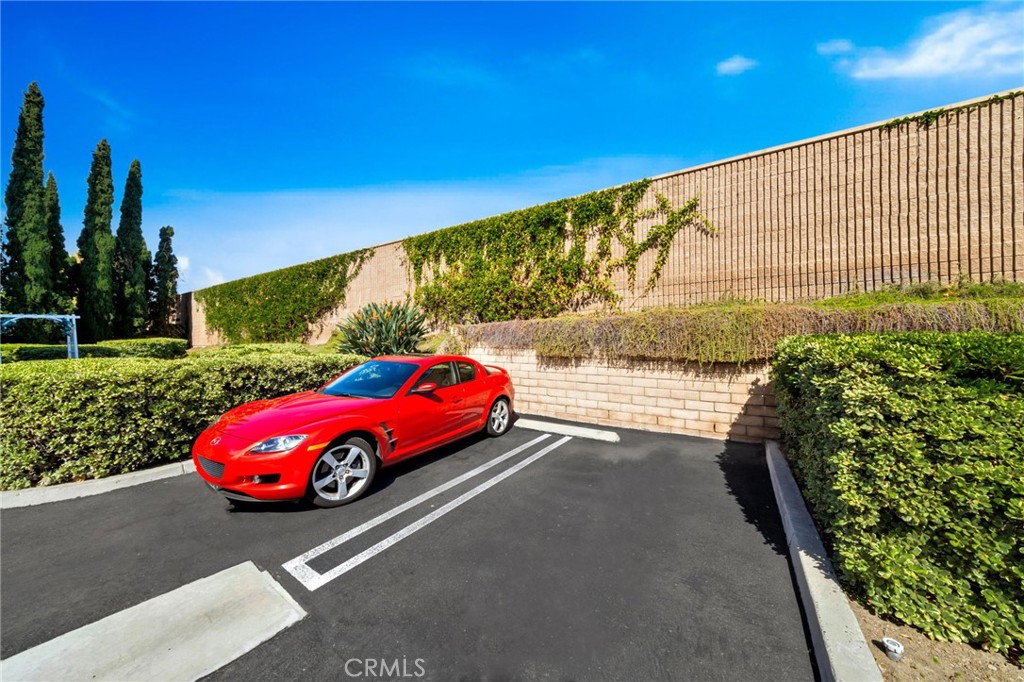 5151 Walnut Avenue, Unit 34 Irvine, CA 92604 - Photo 28 of 38 a view of a car park