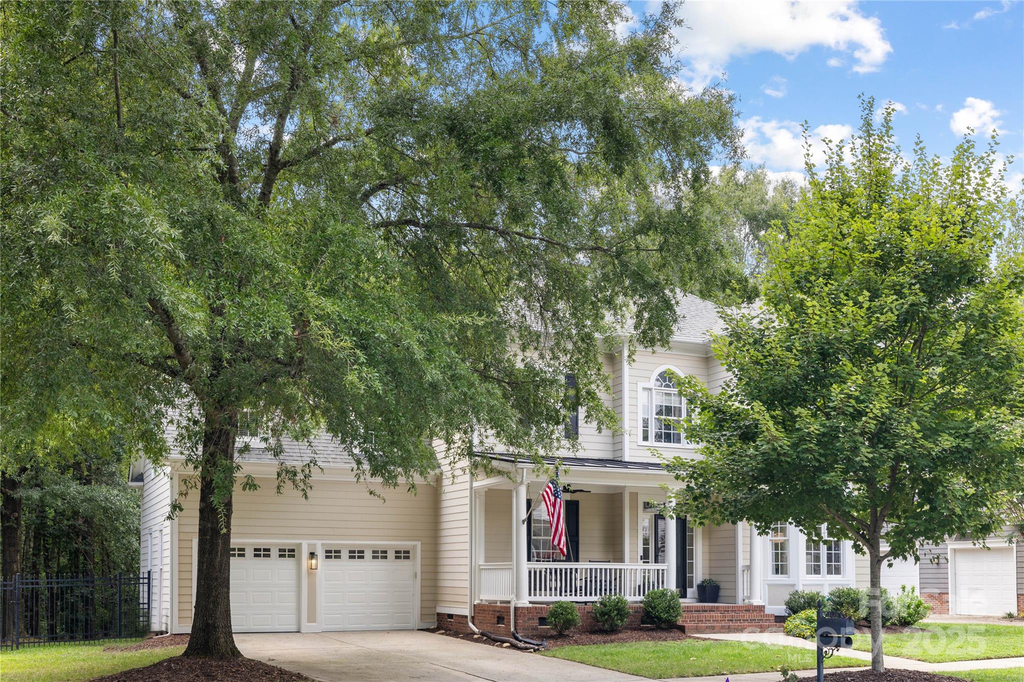 1728 Catherine Lothie Way Fort Mill, SC 29708 - Photo 3 of 36 a front view of a building with trees