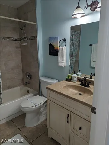 a bathroom with a sink toilet tub and shower