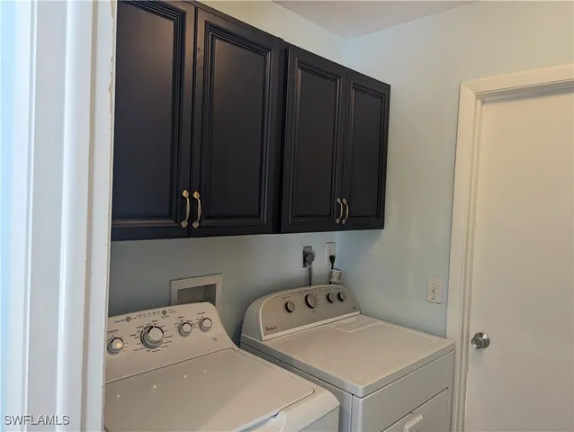 a bathroom with a sink and a window