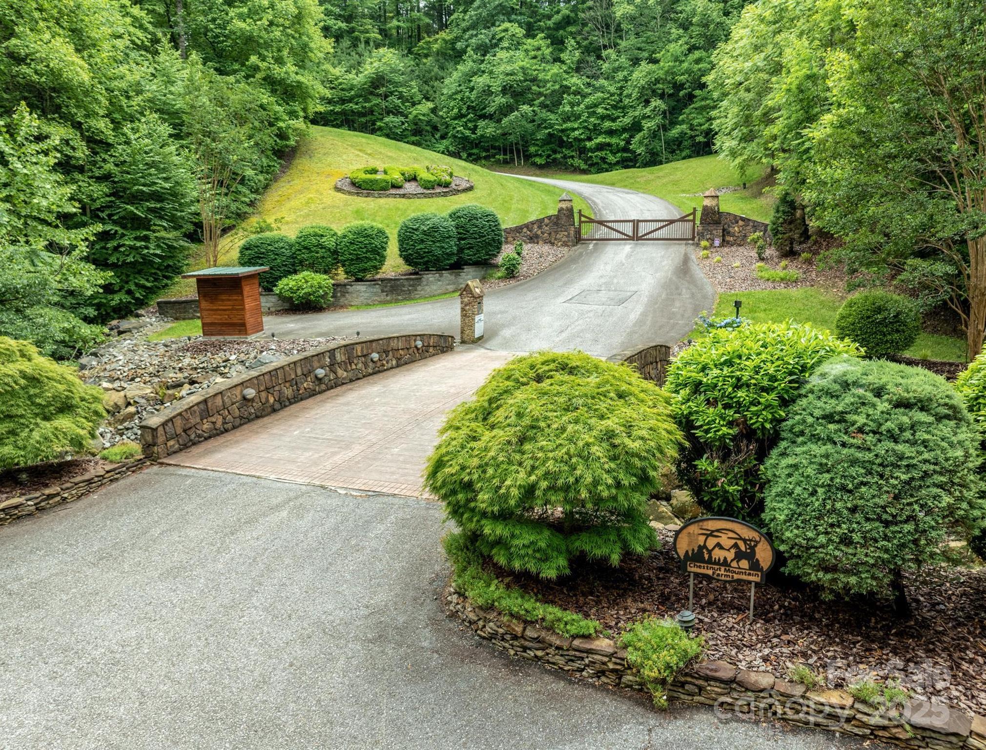 0 Wheel Team Trail, Unit 44 McGrady, NC 28649 - Photo 32 of 48 a view of a garden with a patio