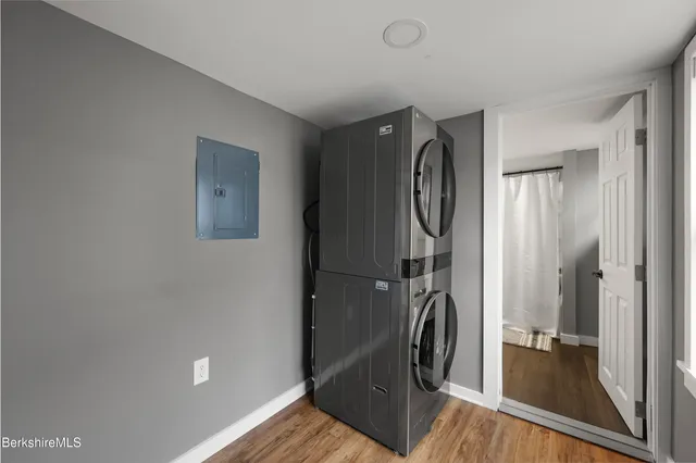 a view of entryway with wooden floor