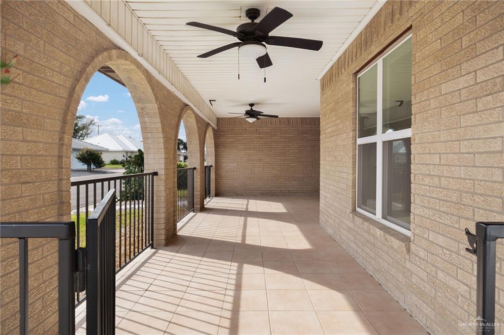 400 Taurus Street Mission, TX 78572 - Photo 2 of 18 a view of a balcony with a ceiling fan