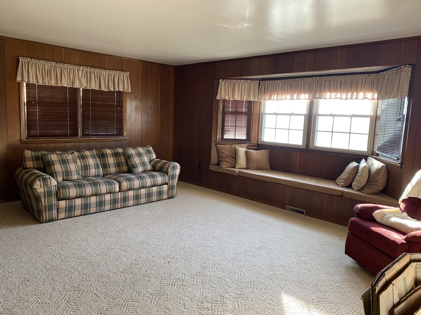 227 East Caroline Street Spring Valley, IL 61362 - Photo 5 of 16 a living room with furniture and a flat screen tv