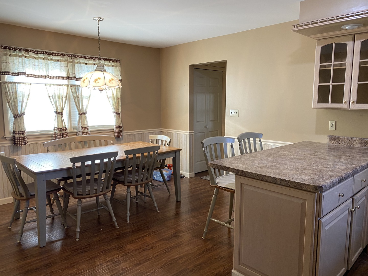 227 East Caroline Street Spring Valley, IL 61362 - Photo 7 of 16 a view of a dining room with furniture and wooden floor