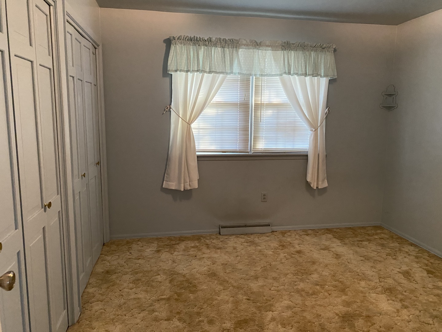 227 East Caroline Street Spring Valley, IL 61362 - Photo 9 of 16 an empty room with a window