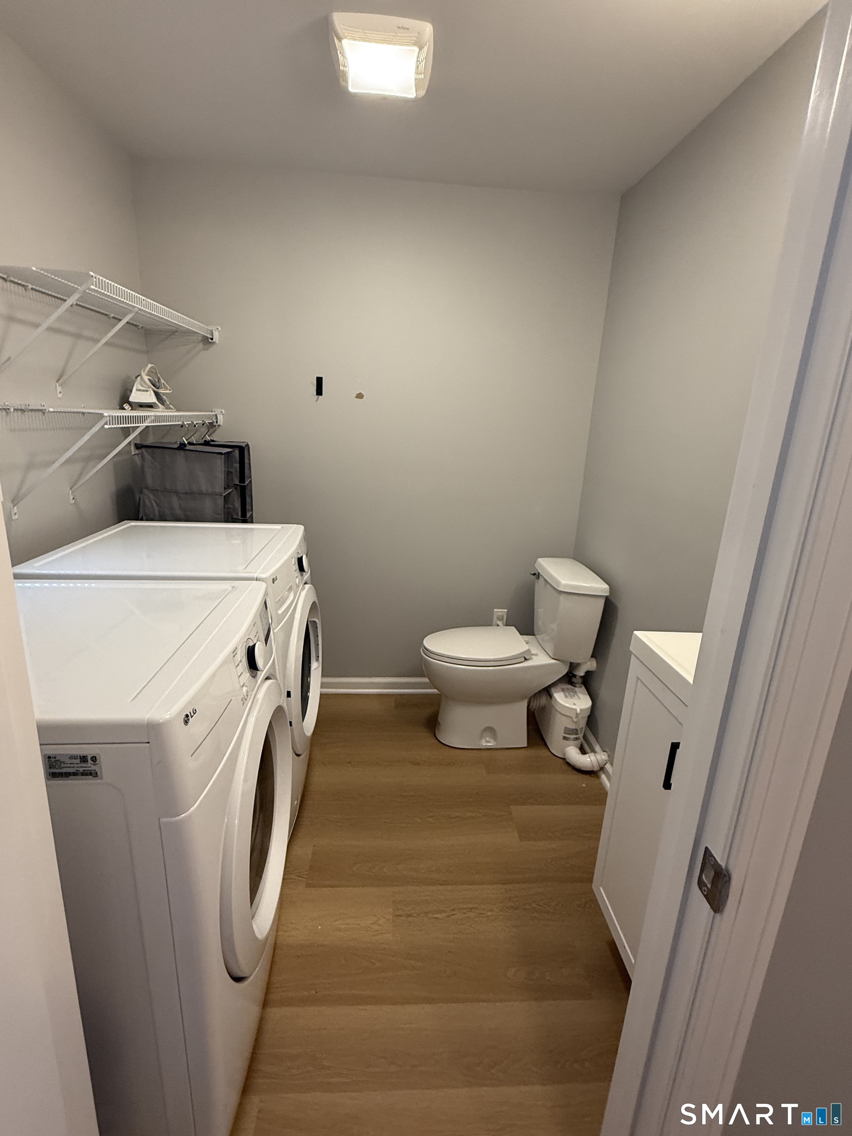 292 Meridian Street, Unit K Groton, CT 06340 - Photo 14 of 20 a utility room with dryer and washer