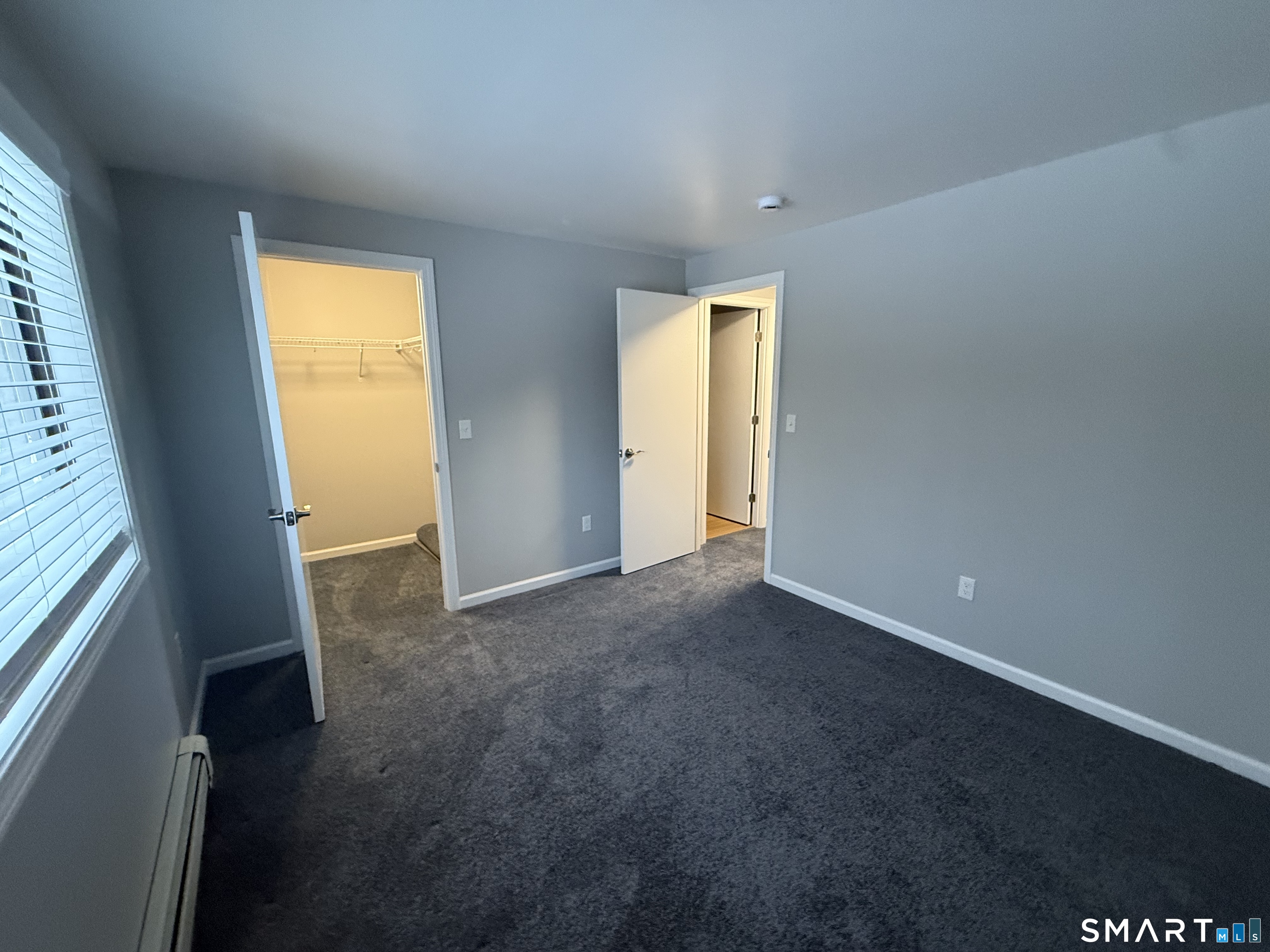 292 Meridian Street, Unit K Groton, CT 06340 - Photo 20 of 20 a view of empty room with window