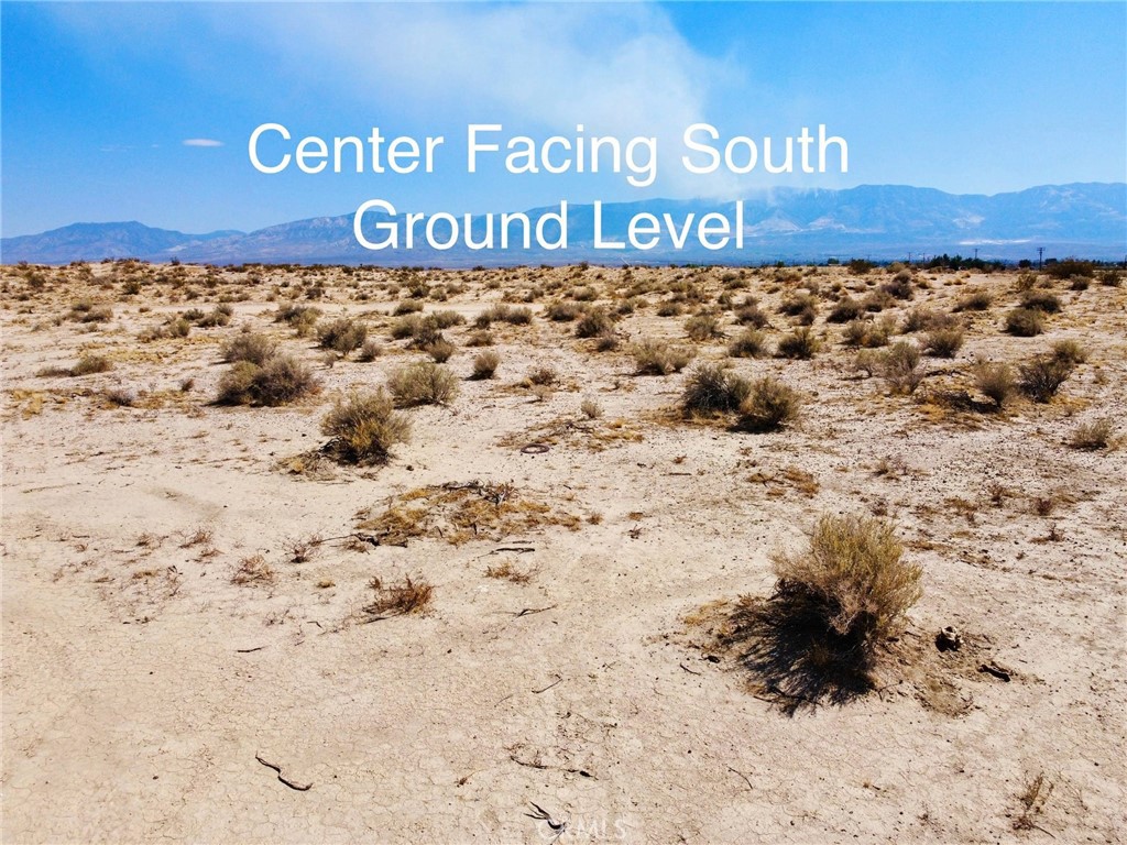 9 Camp Rock Road Lucerne Valley, CA 92356 - Photo 28 of 37 a view of blue sign board