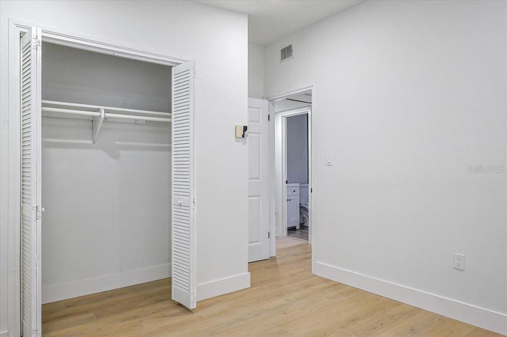 4061 Ferrow Street Orlando, FL 32811 - Photo 23 of 31 a view of a livingroom with wooden floor