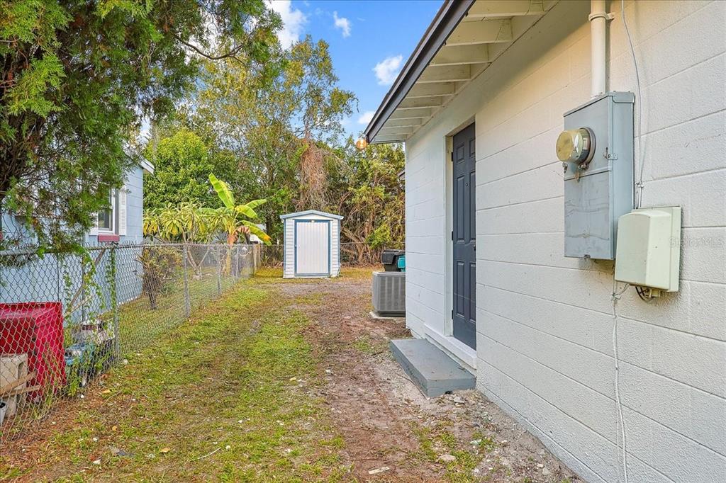 4061 Ferrow Street Orlando, FL 32811 - Photo 27 of 31 a view of back yard of the house