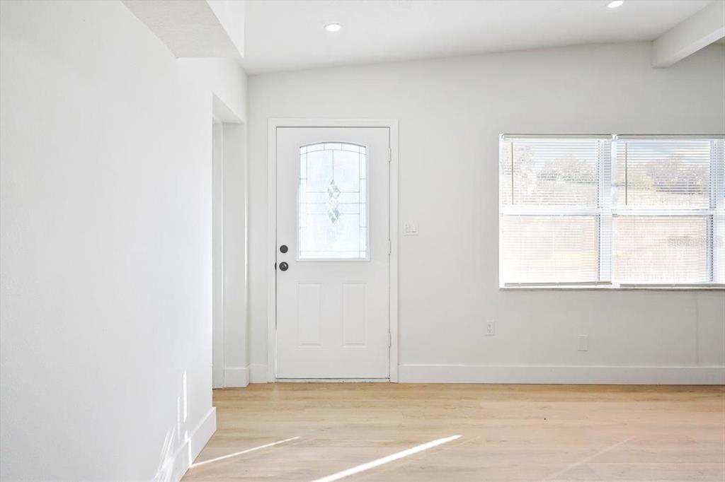 4061 Ferrow Street Orlando, FL 32811 - Photo 3 of 31 a view of an empty room with window