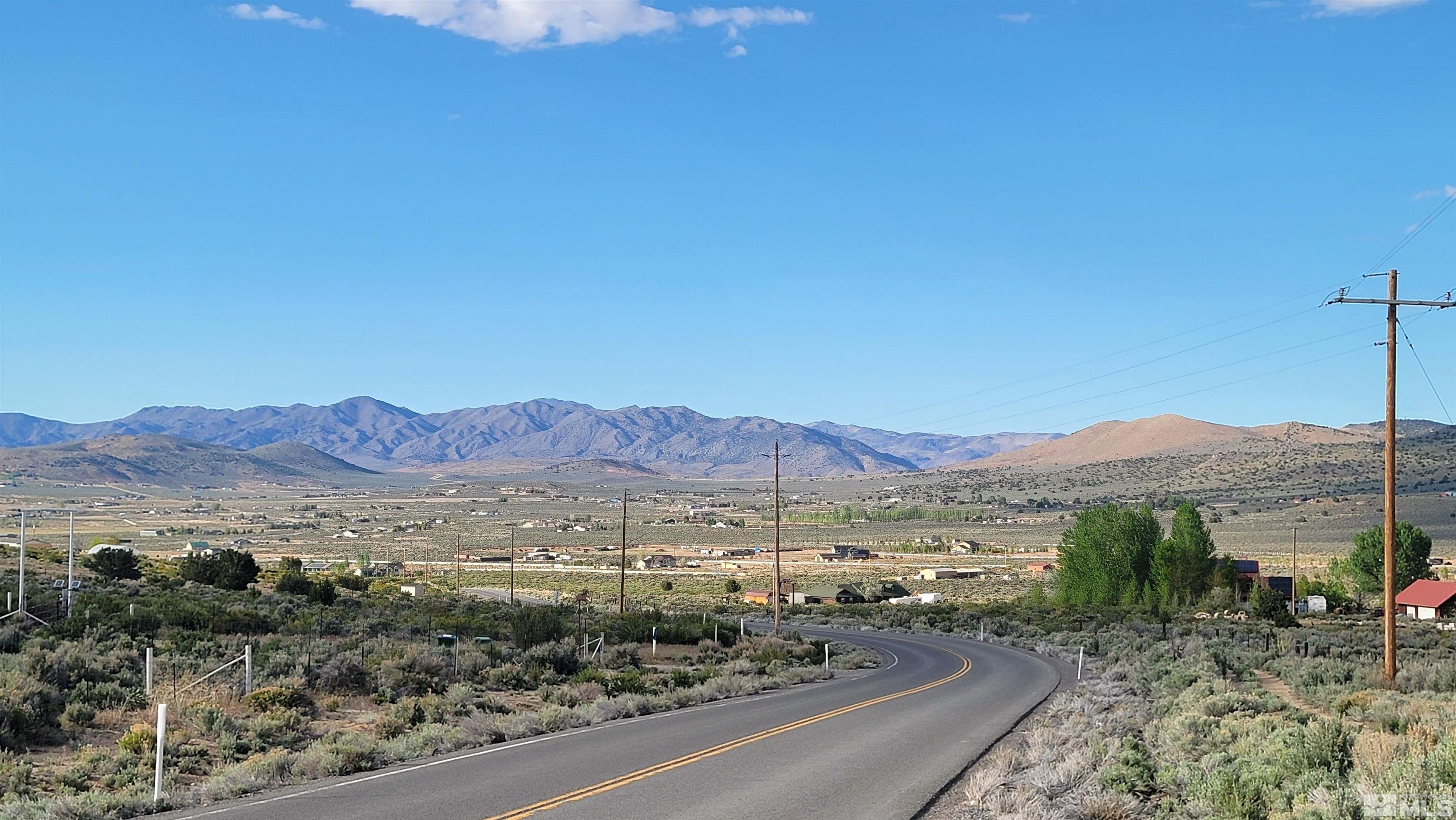 1450 Bronze Hill Road Reno, NV 89506 - Photo 5 of 9 a view of a city with mountain