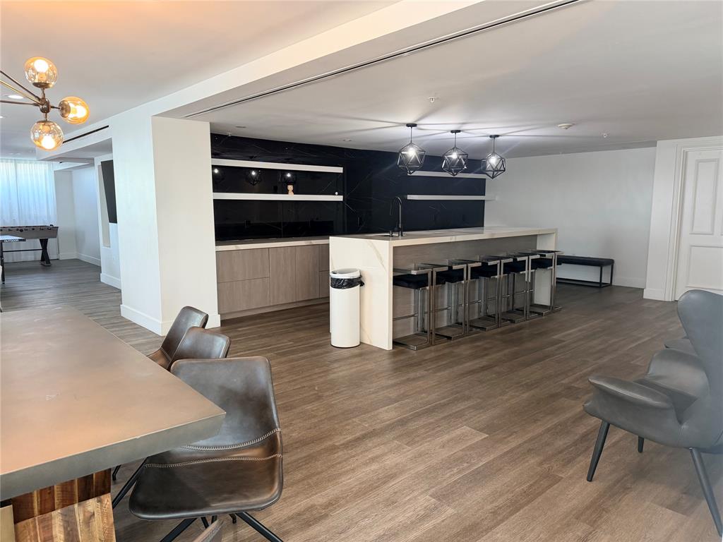 100 North Federal Highway, Unit 1226 Fort Lauderdale, FL 33301 - Photo 21 of 29 a room with furniture and a wooden floor