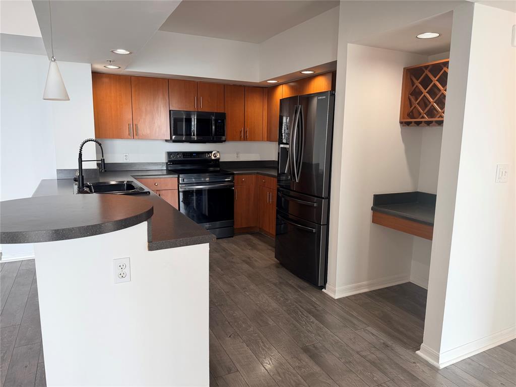 100 North Federal Highway, Unit 1226 Fort Lauderdale, FL 33301 - Photo 5 of 29 a kitchen with stainless steel appliances granite countertop a refrigerator and a stove