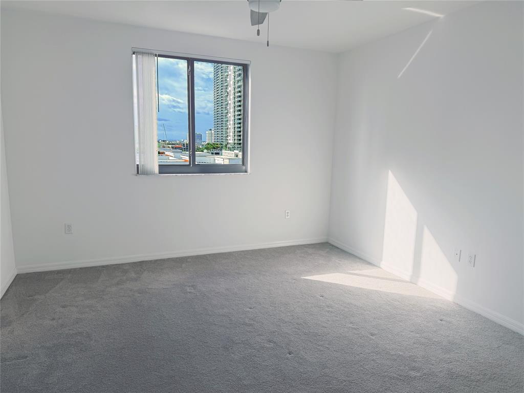 100 North Federal Highway, Unit 1226 Fort Lauderdale, FL 33301 - Photo 7 of 29 an empty room with a window