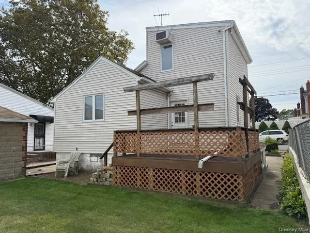 a view of a house with a back yard