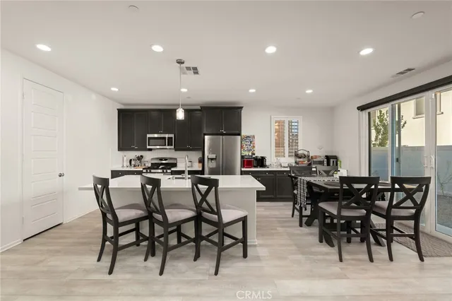 a view of a dining area with furniture window and outside view
