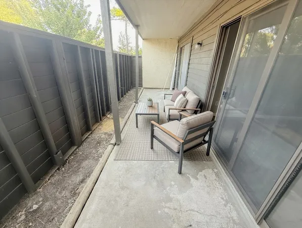 a building outdoor space with patio furniture