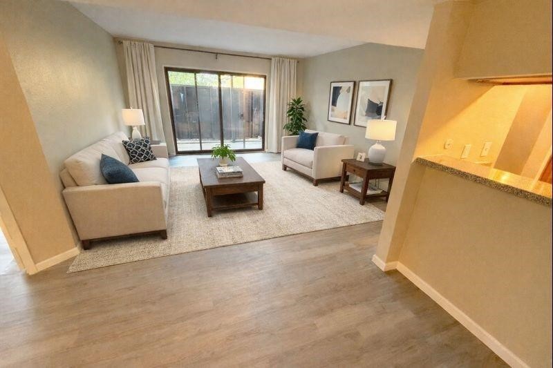 3085 Walnut Bend Lane, Unit 16 Houston, TX 77042 - Photo 3 of 13 a living room with furniture and a large window