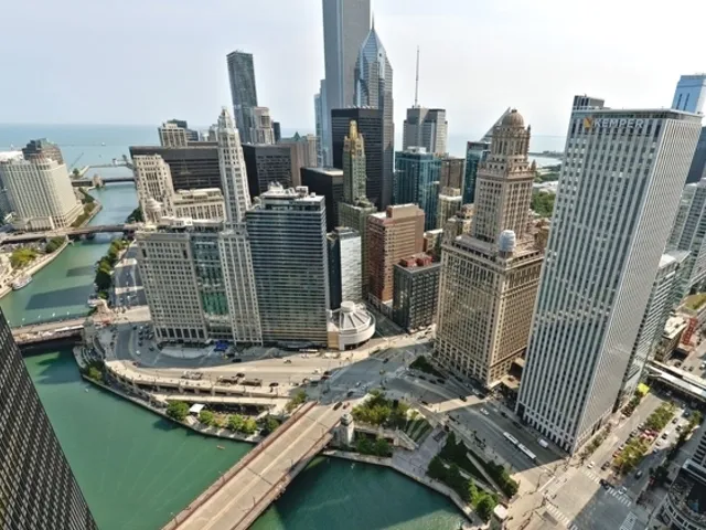 a view of a water pond with sitting area