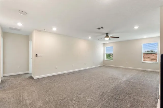 a bathroom with a double vanity sink and mirror