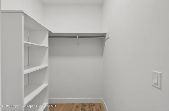 a view of small space with racks on the wall