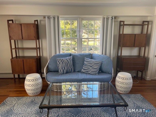 437 Hulls Farm Road Fairfield, CT 06890 - Photo 9 of 15 a view of living room