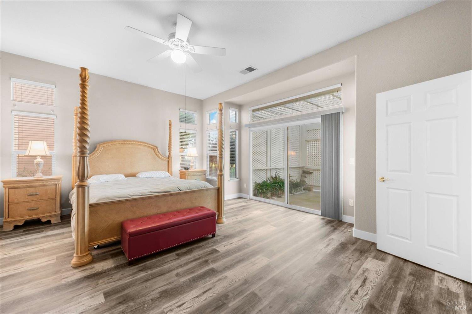 2121 St Andrews Drive Rio Vista, CA 94571 - Photo 20 of 53 a spacious bedroom with a bed and a large window