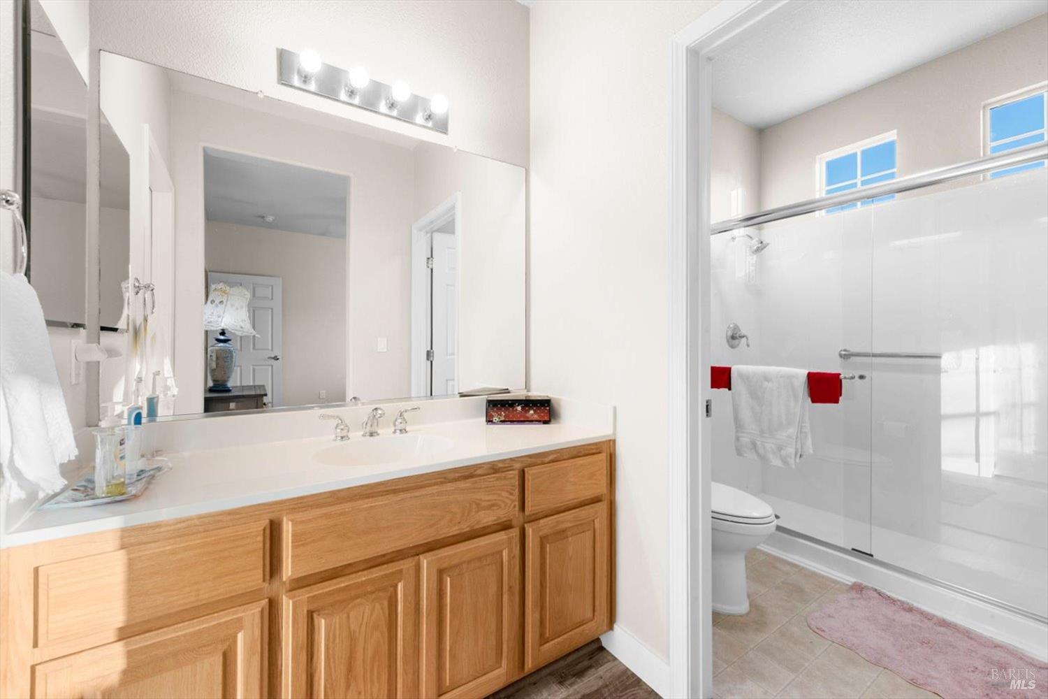 2121 St Andrews Drive Rio Vista, CA 94571 - Photo 31 of 53 a bathroom with a sink vanity tub and a mirror