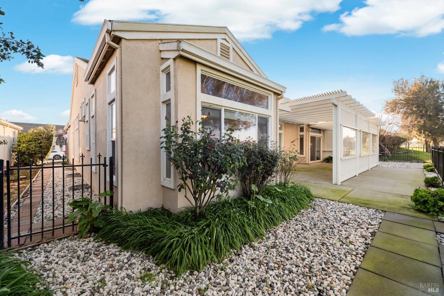 2121 St Andrews Drive Rio Vista, CA 94571 - Photo 39 of 53 a front view of a house with garden