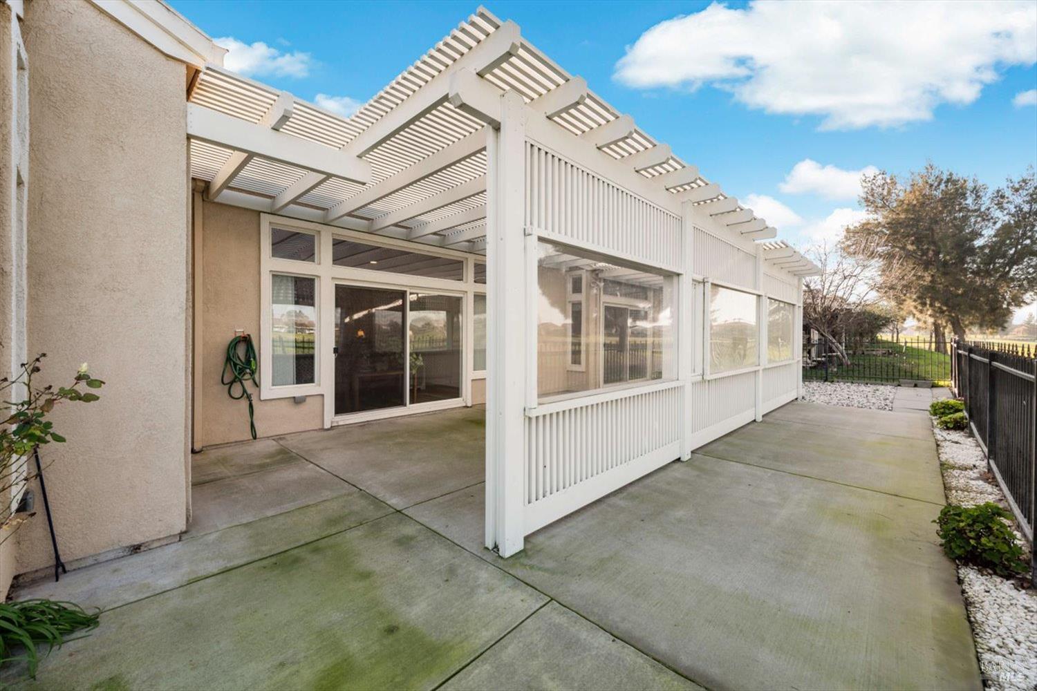 2121 St Andrews Drive Rio Vista, CA 94571 - Photo 40 of 53 a view of a white house with a large window