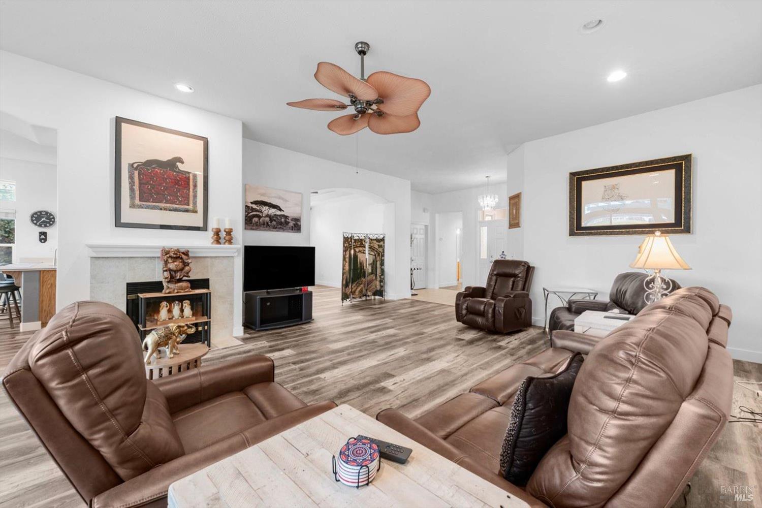 2121 St Andrews Drive Rio Vista, CA 94571 - Photo 6 of 53 a living room with furniture a fireplace and wooden floor