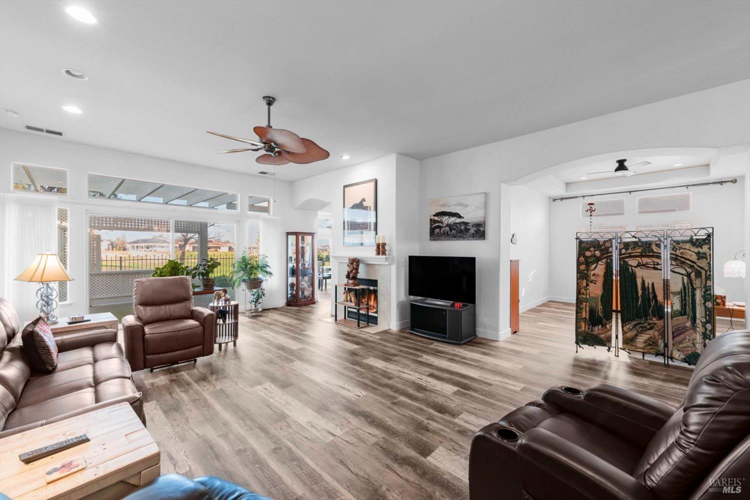 2121 St Andrews Drive Rio Vista, CA 94571 - Photo 7 of 53 a living room with furniture and a fireplace