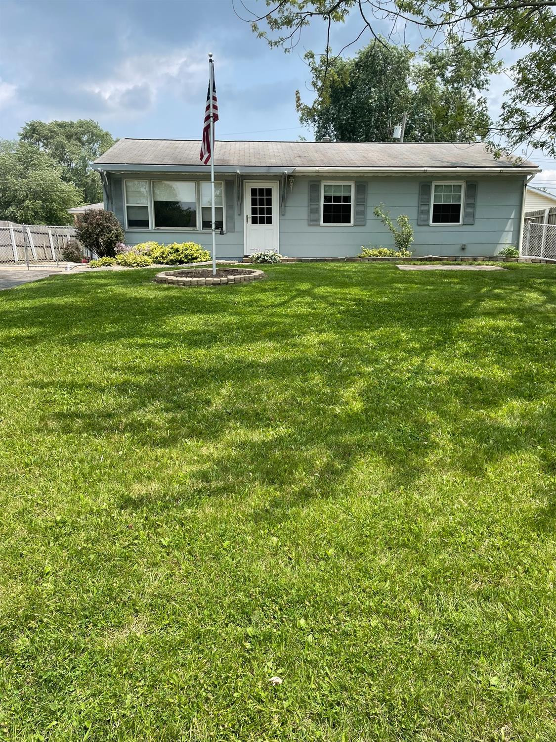 769-1 Imperial Road Valparaiso, IN 46385 - Photo 2 of 16 a front view of house with yard seating and green space