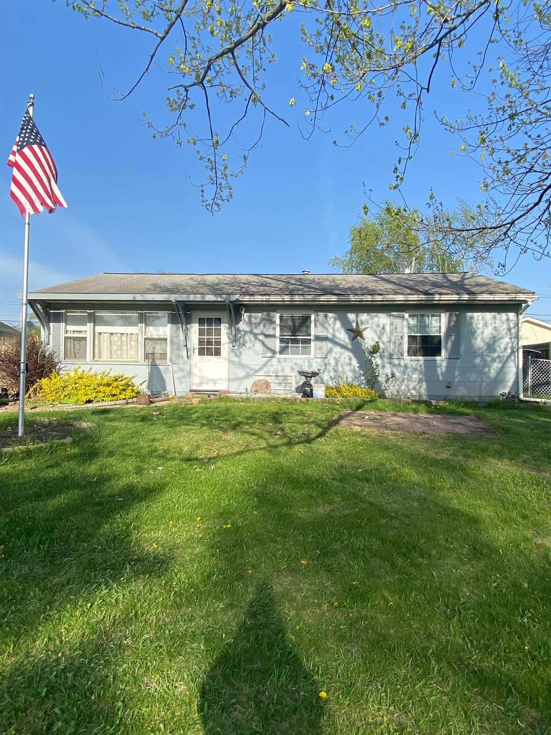769-1 Imperial Road Valparaiso, IN 46385 - Photo 3 of 16 a front view of a house with garden