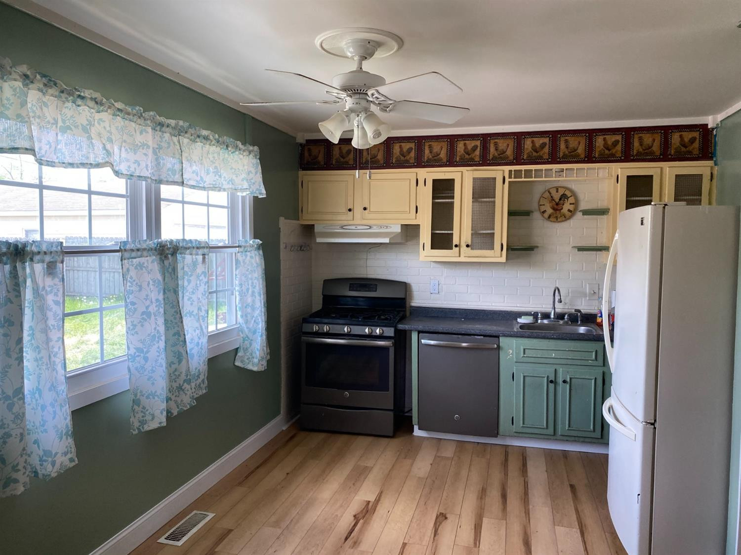 769-1 Imperial Road Valparaiso, IN 46385 - Photo 6 of 16 a kitchen with stainless steel appliances granite countertop a stove and a refrigerator