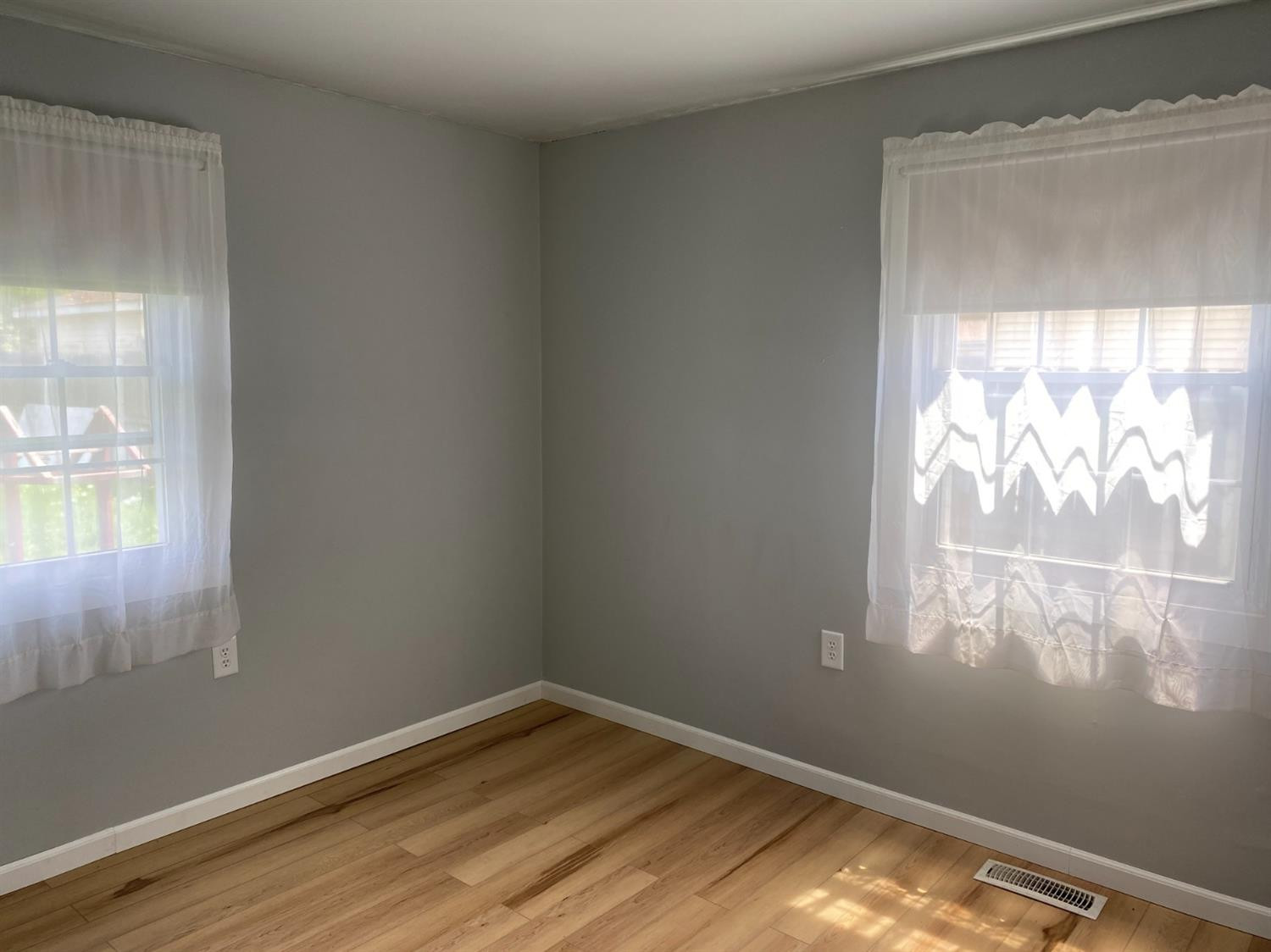 769-1 Imperial Road Valparaiso, IN 46385 - Photo 7 of 16 a view of empty room with wooden floor and fan