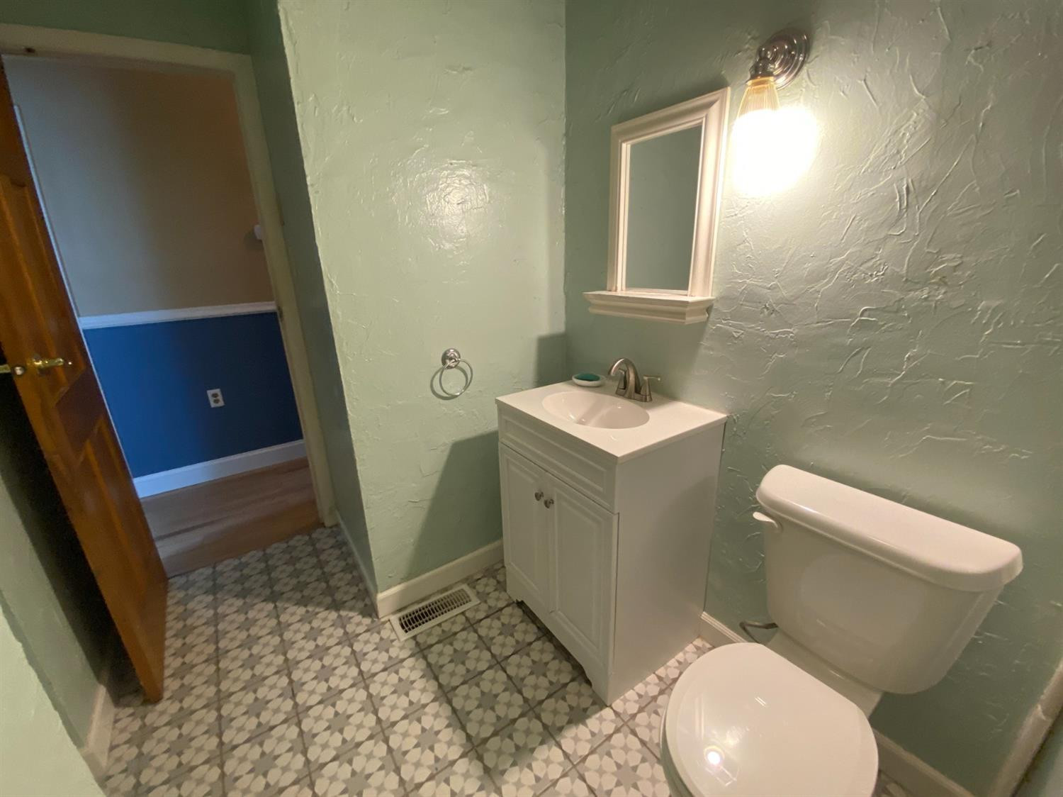 769-1 Imperial Road Valparaiso, IN 46385 - Photo 8 of 16 a bathroom with a sink and a toilet