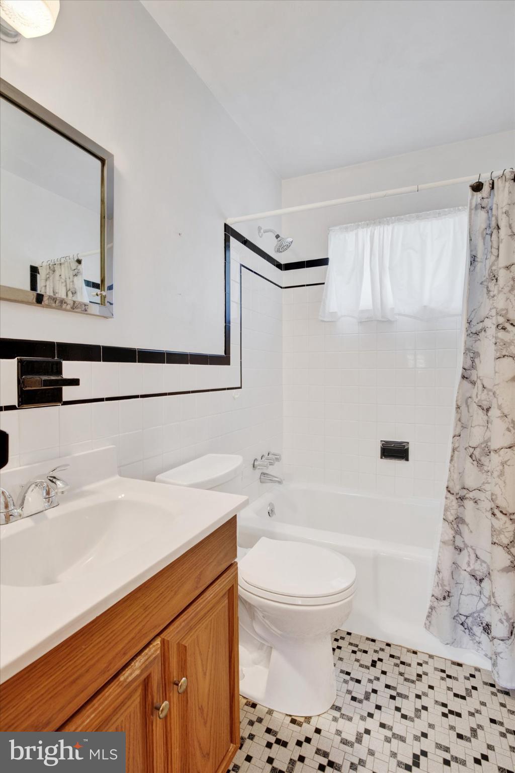 1505 Southview Road Bel Air, MD 21015 - Photo 11 of 25 a bathroom with a sink a toilet and shower