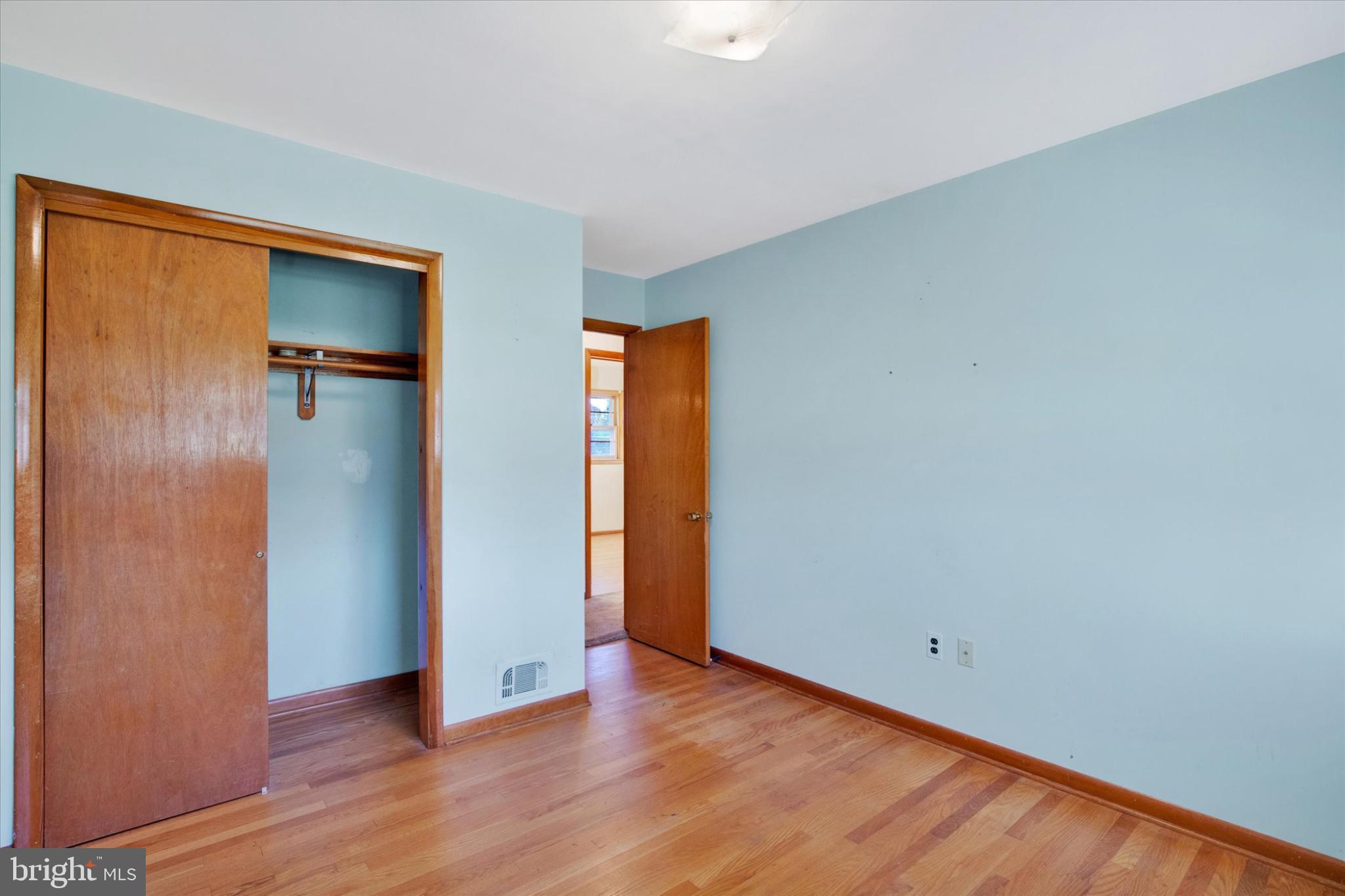 1505 Southview Road Bel Air, MD 21015 - Photo 13 of 25 an empty room with closet and wooden floor