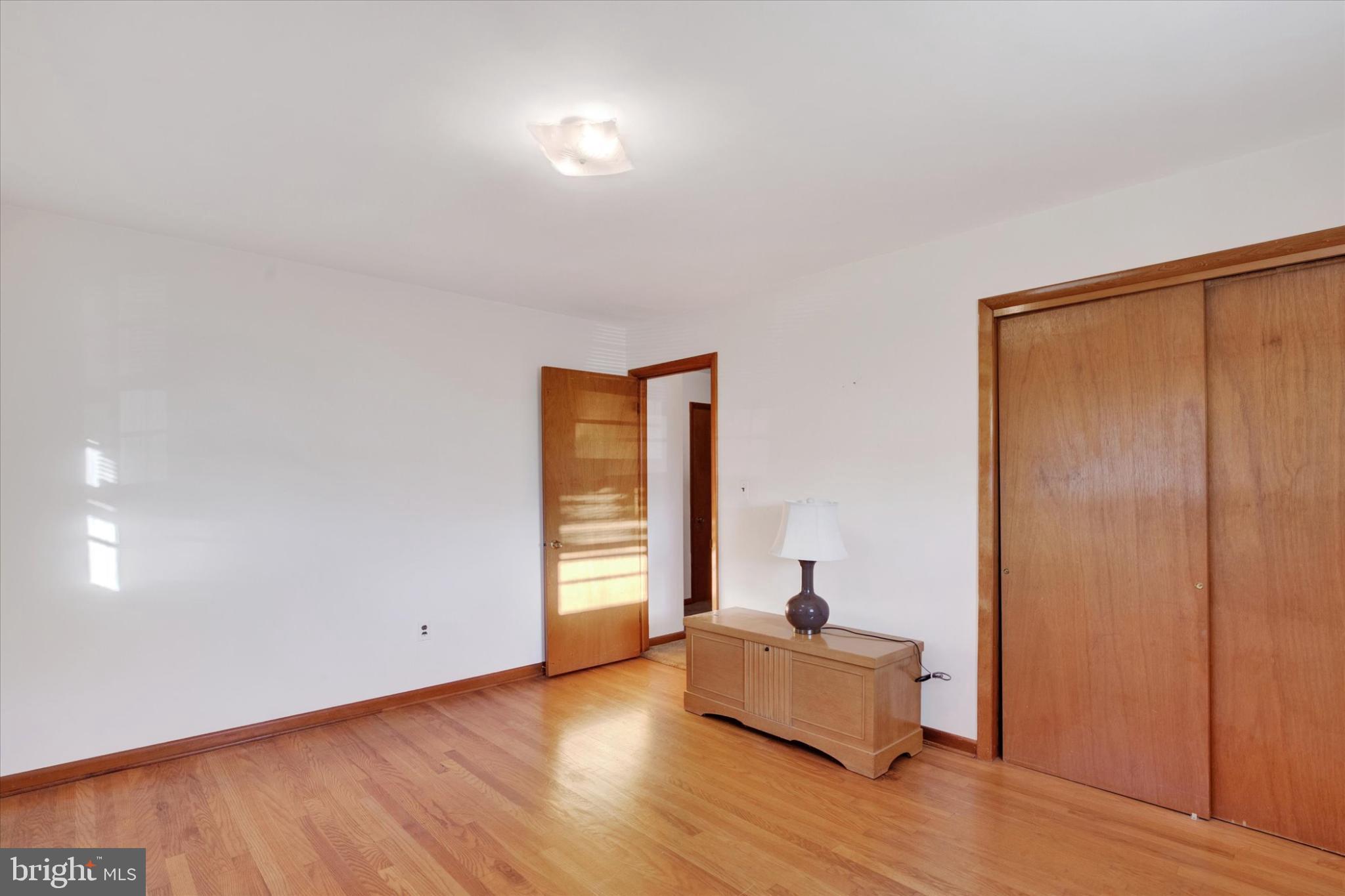 1505 Southview Road Bel Air, MD 21015 - Photo 17 of 25 a living room with furniture and wooden floor