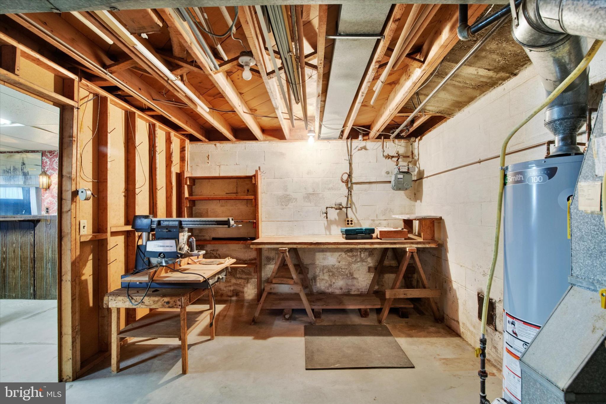1505 Southview Road Bel Air, MD 21015 - Photo 22 of 25 a living room with a couch and a table
