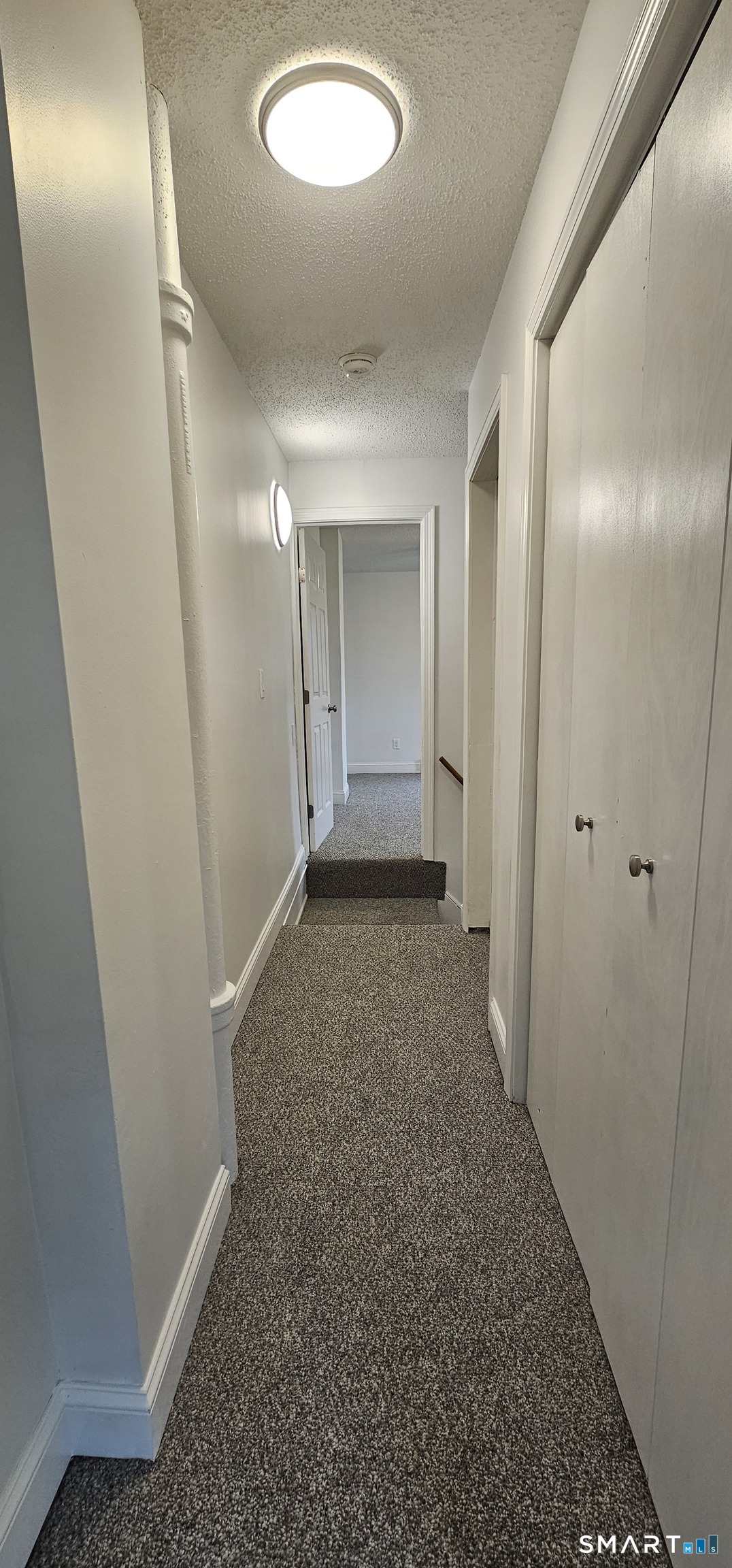 315 Grove Street Meriden, CT 06451 - Photo 7 of 11 wooden floor in an empty room
